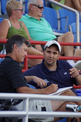 Dane Johnson (L) Blue Jays minor league pitching coordinator and Blue Jays GM Alex Anthopoulos (R) take in Thursday night's Dunedin vs Charlotte Class-A game at Florida Auto Exchange Stadium in Dunedin.  (Eddie Michels/Photo)