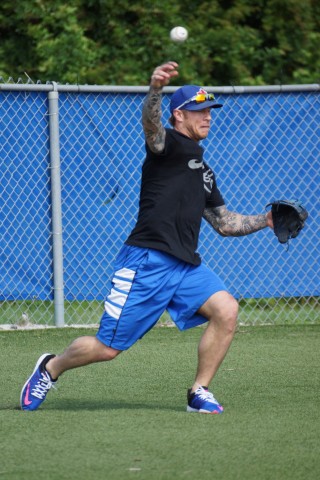 DUNEDIN, FLA.--Blue Jays 3B/2B Brett Lawrie (broken right index finger) made the throw from third with no apparent problems during his third day of workouts at the Mattick Complex.  Lawrie also threw long toss with 1B Adam Lind (broken bone right foot) of up to 150-feet before both took batting practice. (Eddie Michels/Photo)