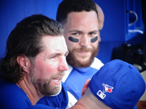 Here RA Dickey consults with piching coach Pete Walker. Dickey had a rough outing today as you can't help but think he was thinking about Marcus Stroman going down for the season with a torn ACL. (EDDIE MICHELS PHOTO)