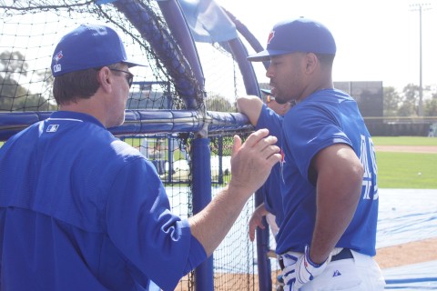Hitting coach Brook Jacoby gives some advice to Dalton Pompey. (EDDIE MICHELS/PHOTO) 
