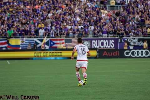 Steve Birnbaum moves with the ball towards a sea of purple  (photo Will Ogburn)