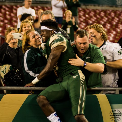 Rodney Adams (87) with post game Ray Jay Leap