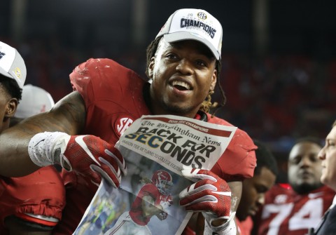  Derrick Henry celebrates his 29-15 win over the Florida Gators in the 2015 SEC Championship Game at the Georgia Dome. (photo Butch Dill / USA TODAY Sports)
