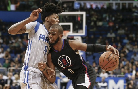  Elfrid Payton (4) defends against the drive from Los Angeles Clippers guard Chris Paul (3) during the first quarter. (photo Reinhold Matay / USA TODAY Sports)