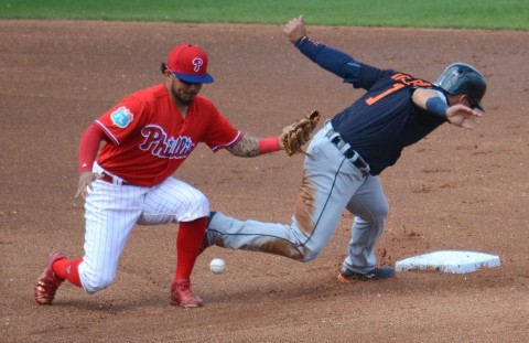 Detroit Tigers shortstop Jose Iglesias steals second base Thursday as the throw eludes Philadelphia Phillies shortstop Freddy Galvis. (photo Buck Davidson)