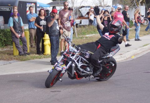 Stunt rider Bryan Marino entertains fellow bikers (EDDIE MICHELS PHOTO)